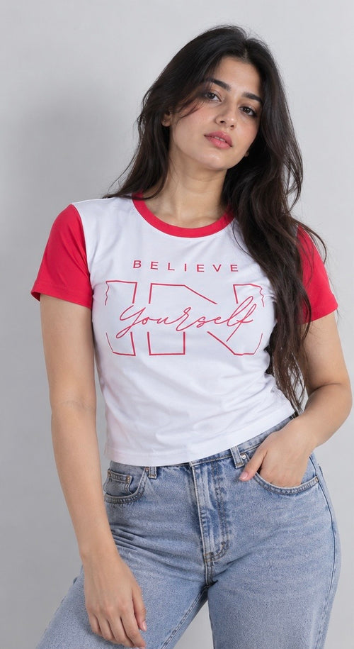 Front view of the white and red Believe Yourself graphic T-shirt